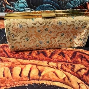 Elegant Gold Floral Clutch